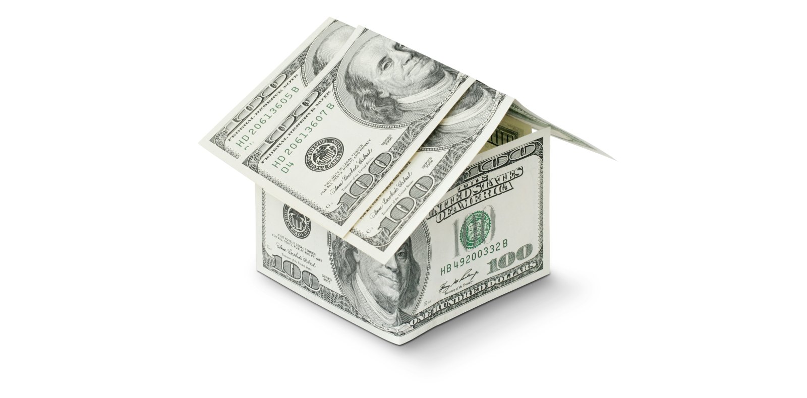 House shape made of US dollar bills representing real estate investment and home financing.